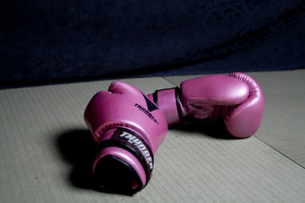pink boxing gloves to symbolize contested vs uncontested divorce